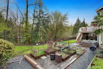 Gardening space, hot tub off the large deck.
