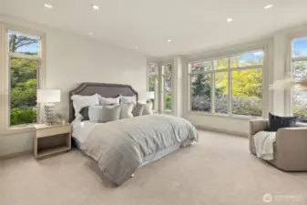 The main floor primary suite is a true sanctuary of comfort, featuring custom lighting, automated shades, and a room with spectacular views that create a truly serene escape.