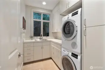 A well-appointed laundry room conveniently located on the main level adds everyday ease with style and functionality.
