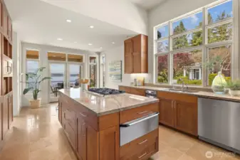 High-end stainless-steel appliances, sleek custom cabinetry, and an abundance of natural light come together in a designer kitchen layout that’s sure to inspire even the most discerning chef.