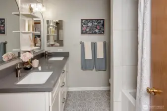 Remodeled ensuite BA with luxe soaking tub.