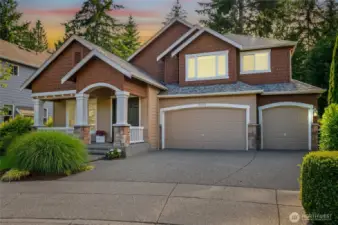 Spacious 3-car garage, and covered porch.