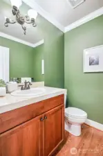 Half bath tastefully designed with modern finishes.