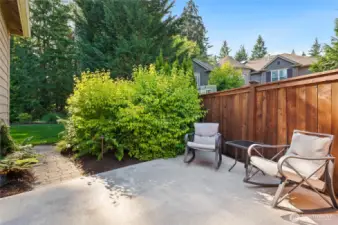 Private patio extended to the side of the house and access through the garage. Perfect for additional entertainment space, relaxing, or creativity.