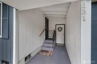 Covered breezeway with attached garage