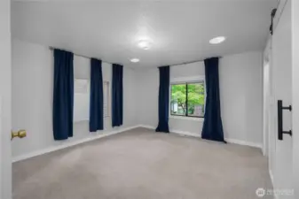 Primary suite looks towards the back of the home.