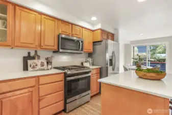 Quartz counters and stainless appliances.