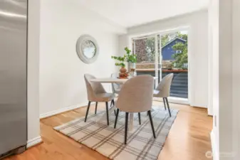 The breakfast nook is on the east end of the kitchen, next to the sliding door to a rear deck.