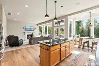 Kitchen opens to second living room, great for entertaining.