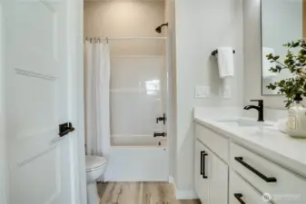 Full bath with a tub downstairs for those times when you just need a good soak!