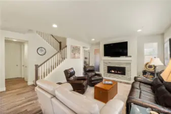 View of the family/great room with access to outdoor covered porch.