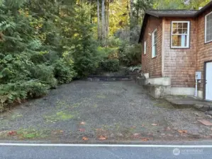 Off street parking on east side of cabin.  Easy access to garage and back door of cabin.