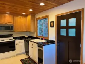 Appliances include dishwasher and trash compactor.