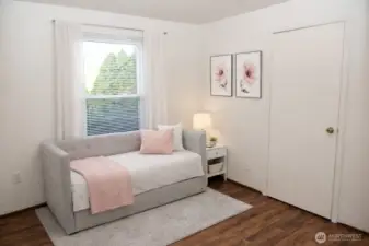 Virtually staged third bedroom and closet.