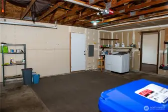 Two car garage with door to back yard.
