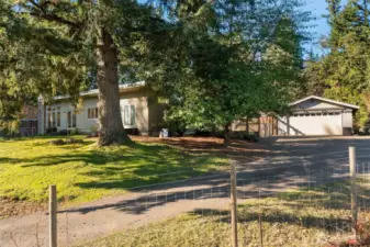 The home is beautifully sited on a knoll overlooking gardens and pastures. Perfectly situated to capture the best sun exposure all year long.