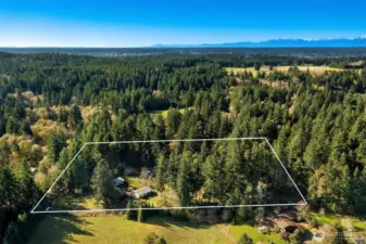 Vashon Island is truly the gateway to the entire Puget Sound region. Olympic Mountains in the distance. Boundary lines are approximate.