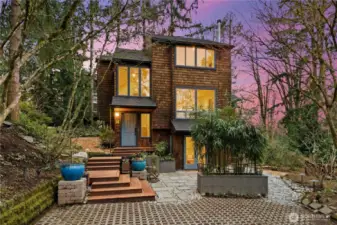 Charming home with shingle-siding.