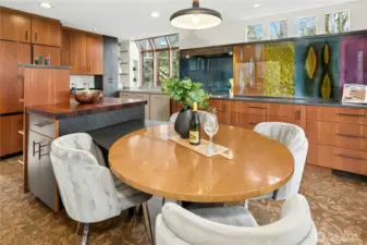 This Birdseye Maple table was custom made for the home and will remain.