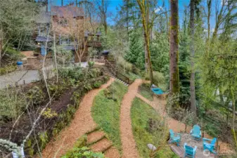 Pathways, hammock and seating areas in yard.