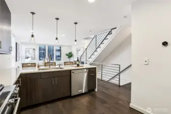 Kitchen facing dining and living room.