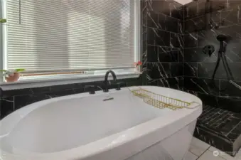 Time to relax and use your brand-new soaking tub and gorgeous tiled shower!