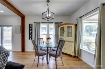 Dining area is to right side of entry. Look at all the windows allowing for bright natural lighting!