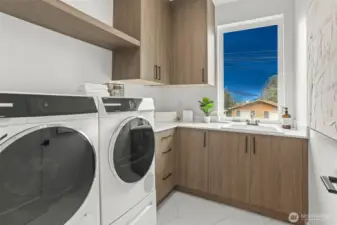 Upper Level Laundry Room with Full Size Washer/Dryer, Cabinets and Counters/Shelving