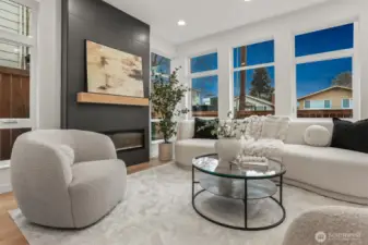 Cozy Living Room with Fireplace with Floor to Ceiling Surround