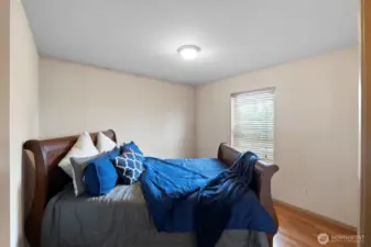 Two of the three guest bedrooms are located on the upper level, providing a comfortable and private retreat.