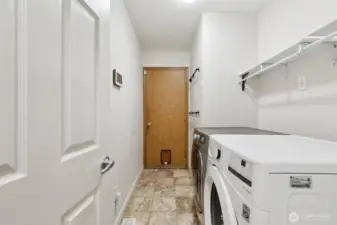 Laundry looking towards the door to the garage