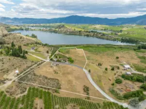 “Luxury Country Living with Vineyard, Views & Buildable Acreage”