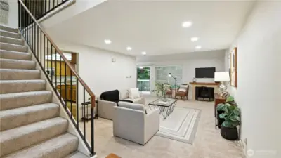 Admire the spacious staircase adorned with an elegant railing, adding a touch of sophistication to the home