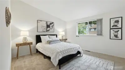 The primary bedroom combines a sleek design with natural light and spaciousness, perfect for adding seating areas beyond the bed