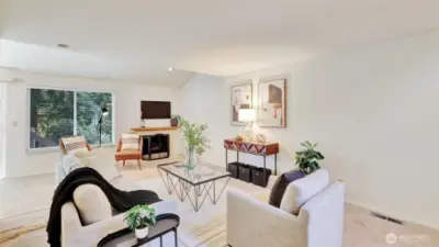 Gather around this inviting fireplace accented with elegant tile, surrounded by open living space ready for your custom furniture choices