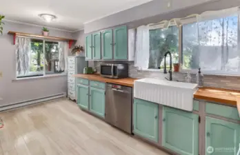 Updated kitchen with farm sink and plenty of room to bake