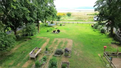 Garden area, flowers, fruit tress and room to create your own haven at the coast.