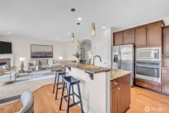 Granite counters on island bar and kitchen