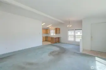 Living room looking towards dining area and kitchen.