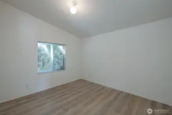 Bedroom #2 with new flooring.