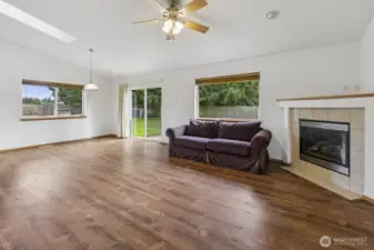 Access the back yard through the sliding doors directly off the living room
