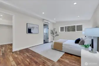 Primary bedroom retreat with fresh finishes and calming views.