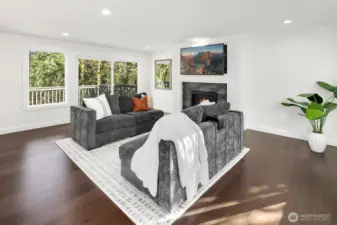 main level living room with deck access