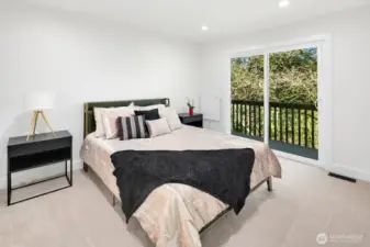 upper level primary bedroom with ensuite bathroom