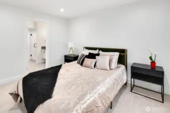 upper level primary bedroom with ensuite bathroom