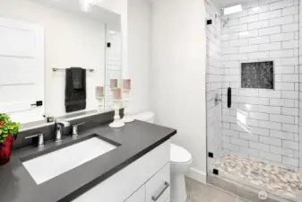 upper level 3/4 bathroom off hallway