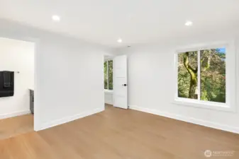 lower level primary bedroom with en suite bathroom