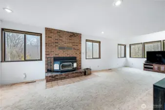 Main floor living room with insert will keep you toasty