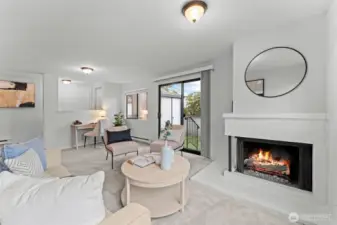 Thoughtfully staged with cozy seating and contemporary accents, the space feels both comfortable and refined—perfect for relaxing or hosting guests.