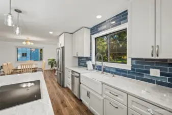 Farm sink with window looking out at rest of property.